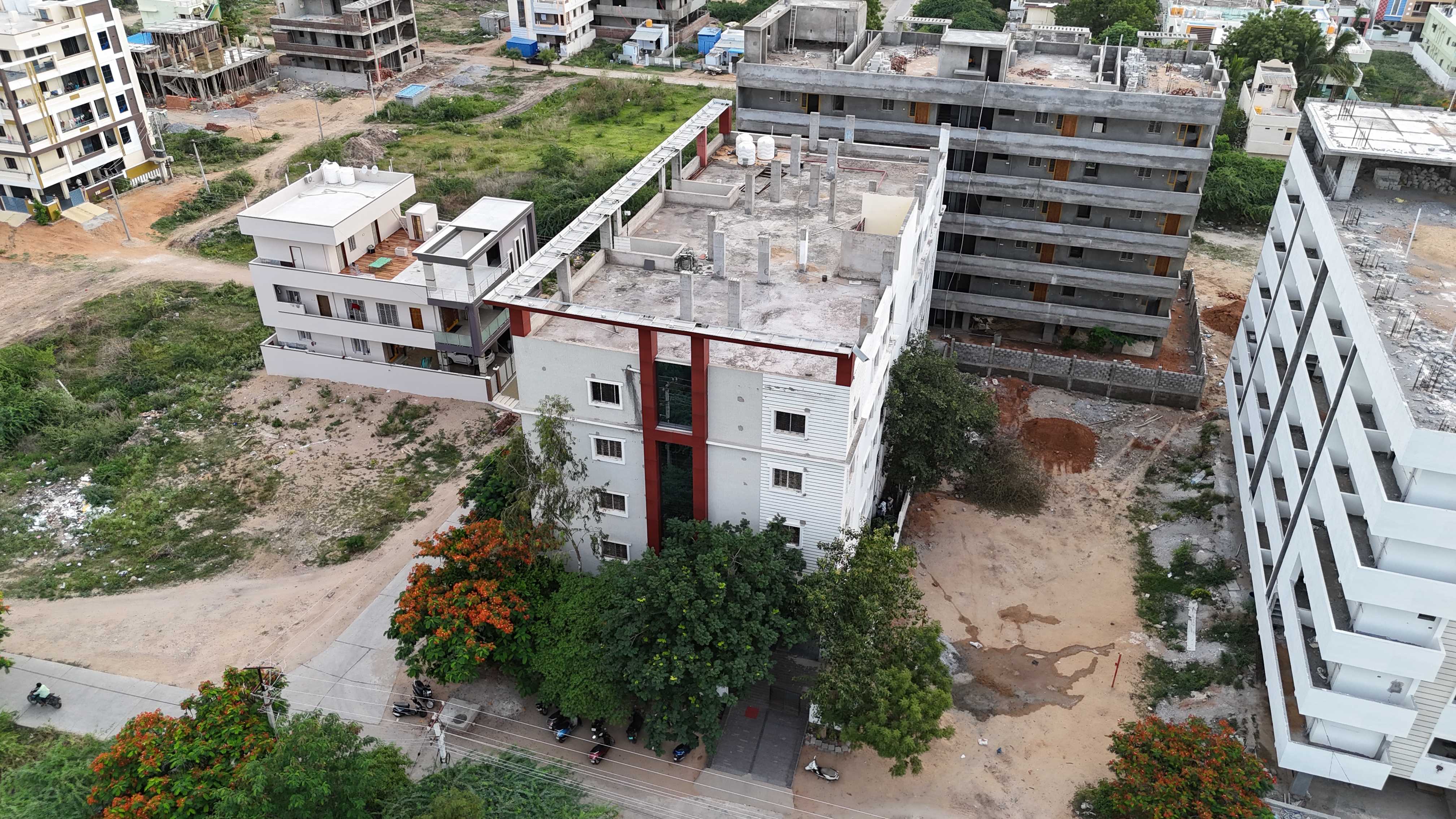 Apartment and School Anantapur Redrock Constructions