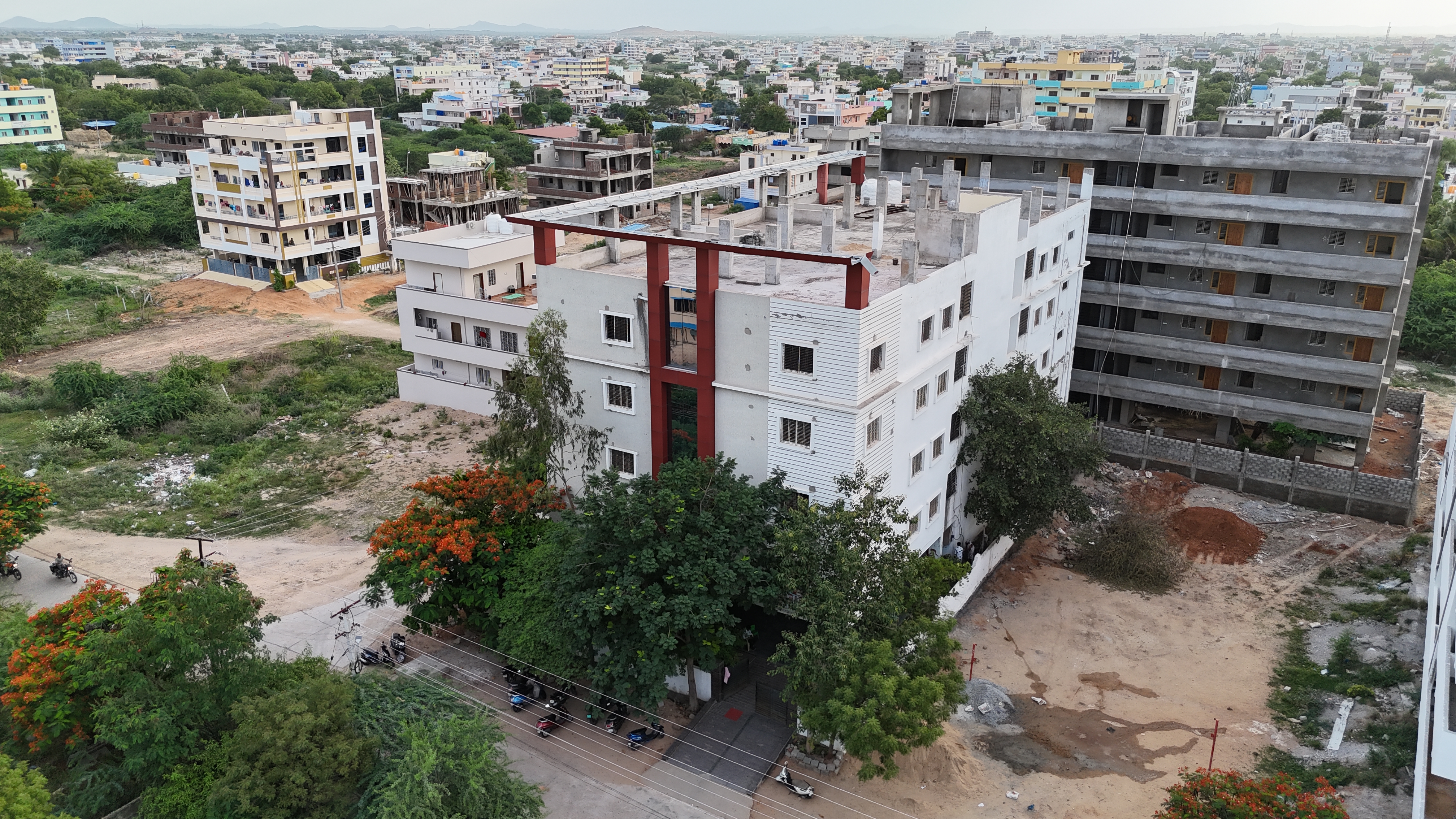 Apartment and School Anantapur Redrock Constructions