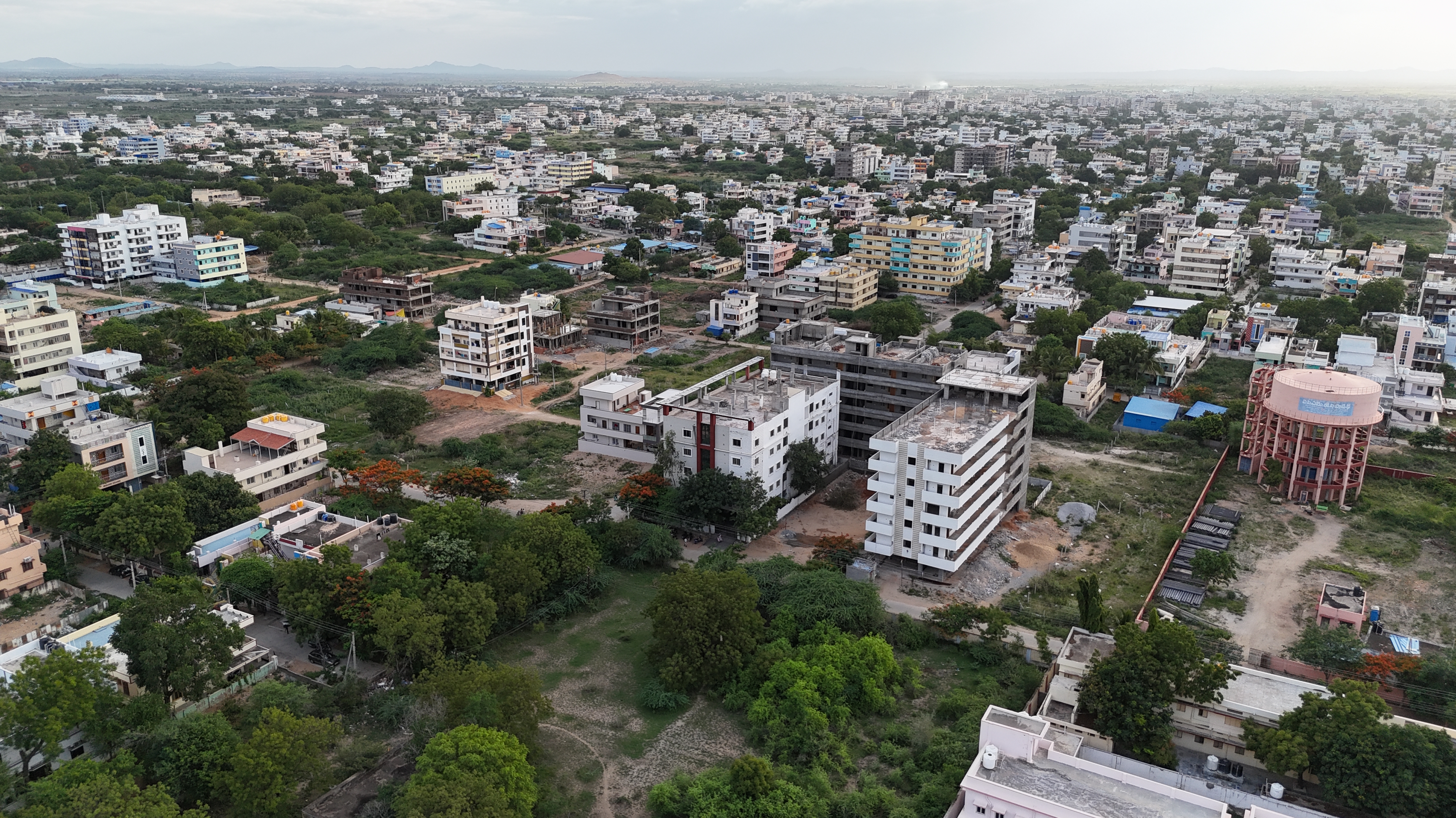 Apartment and School Anantapur Redrock Constructions
