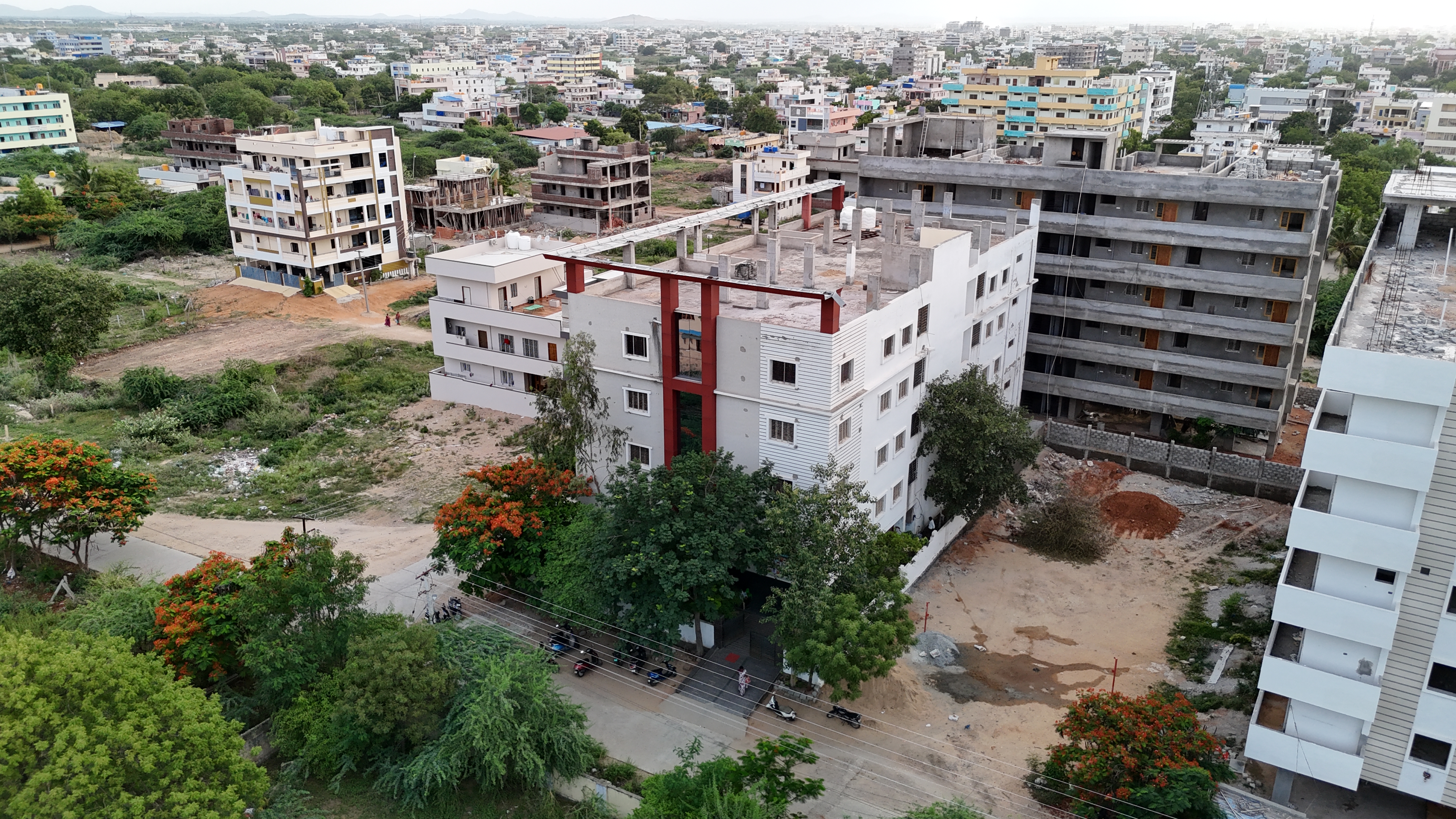 Apartment and School Anantapur Redrock Constructions